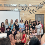 Group of Vet Tech graduates posing together for a photo